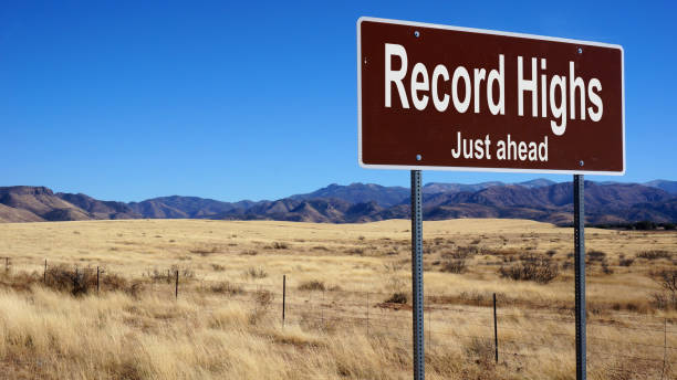 record highs ahead road sign